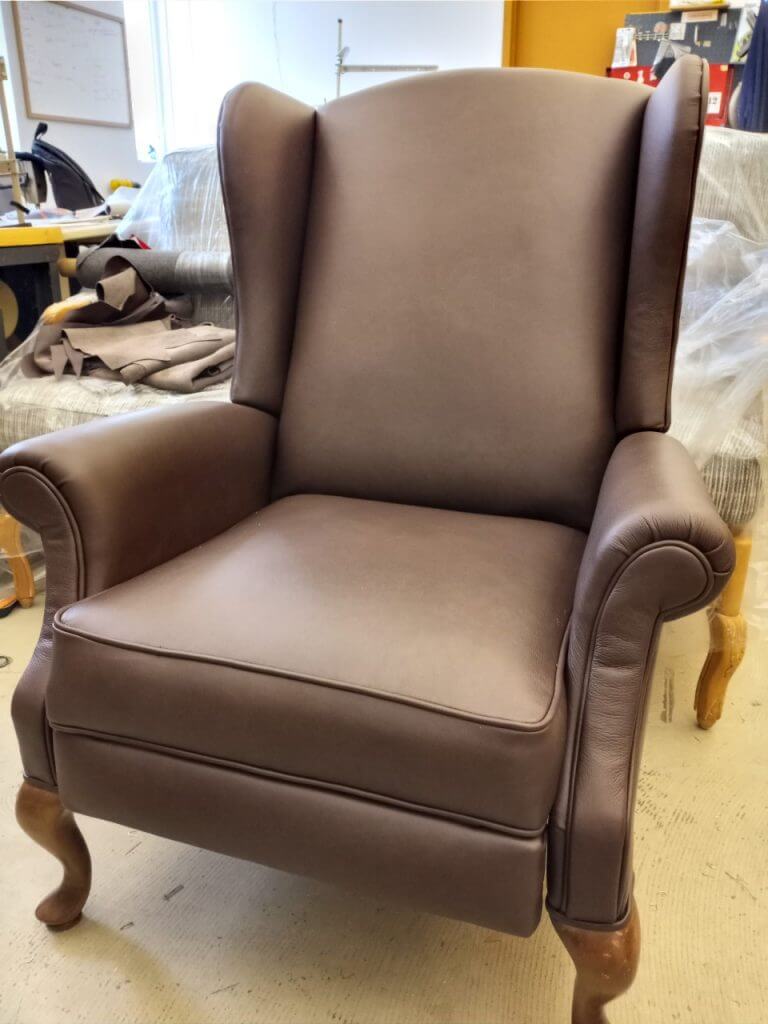 Close-up of an elegant brown chair.